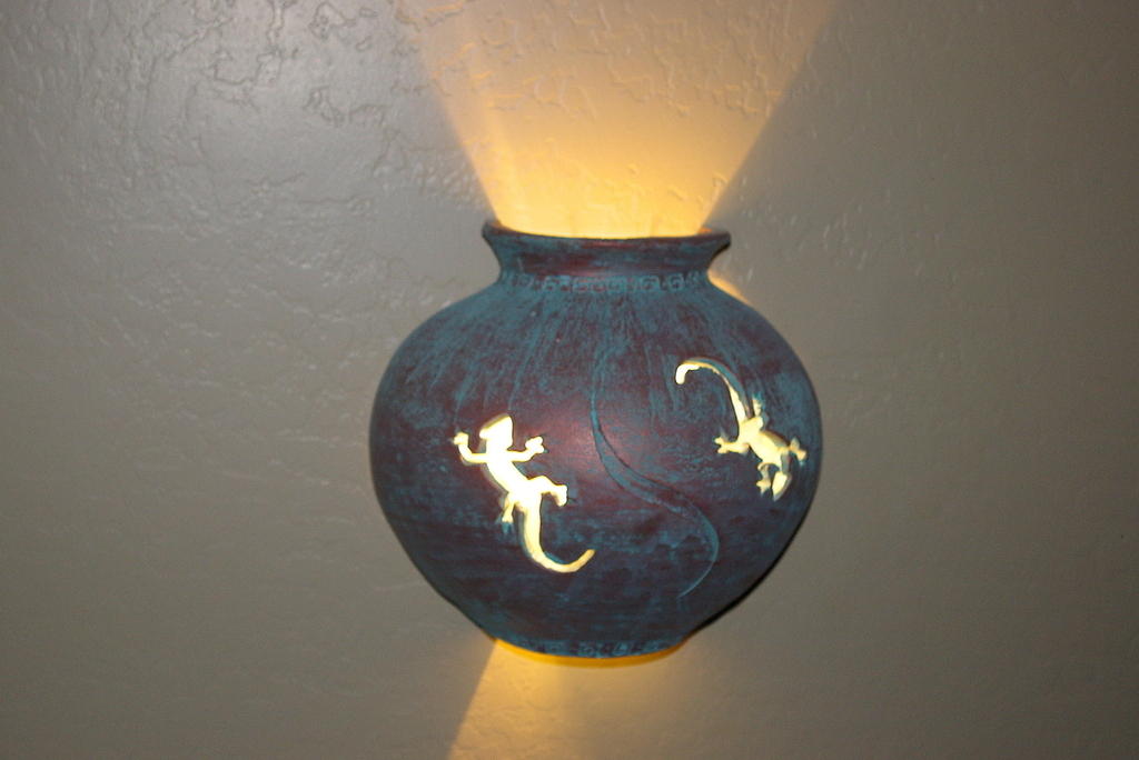 This is a less artsy picture of the Gecko light.  It's a copper-like finish.