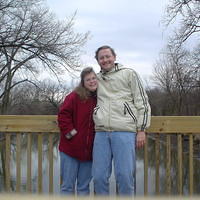 Gretchen and Tim on a bridge over the river by the lodge.  This was taken with the delay feature on my new Sony Cyber-shot U-30